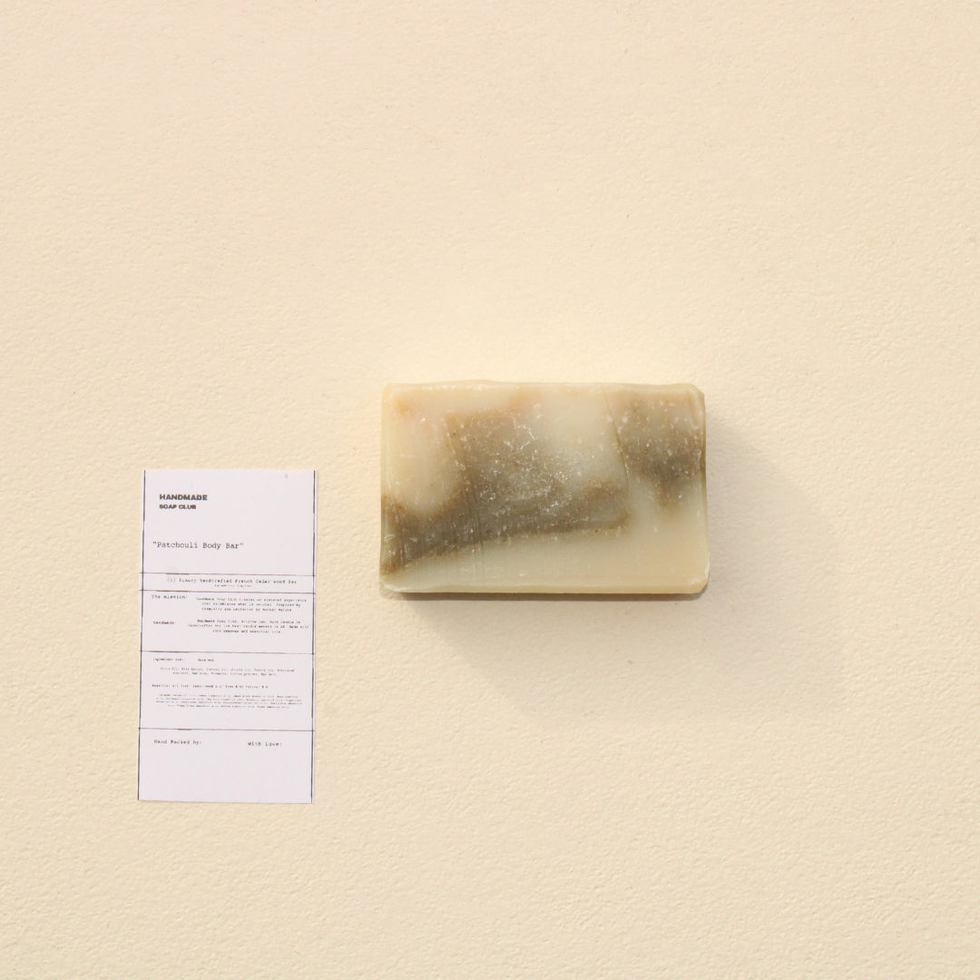 Lifestyle photo showing Patchouli & Ylang Ylang Body Bar in use - Handmade Soap Club
