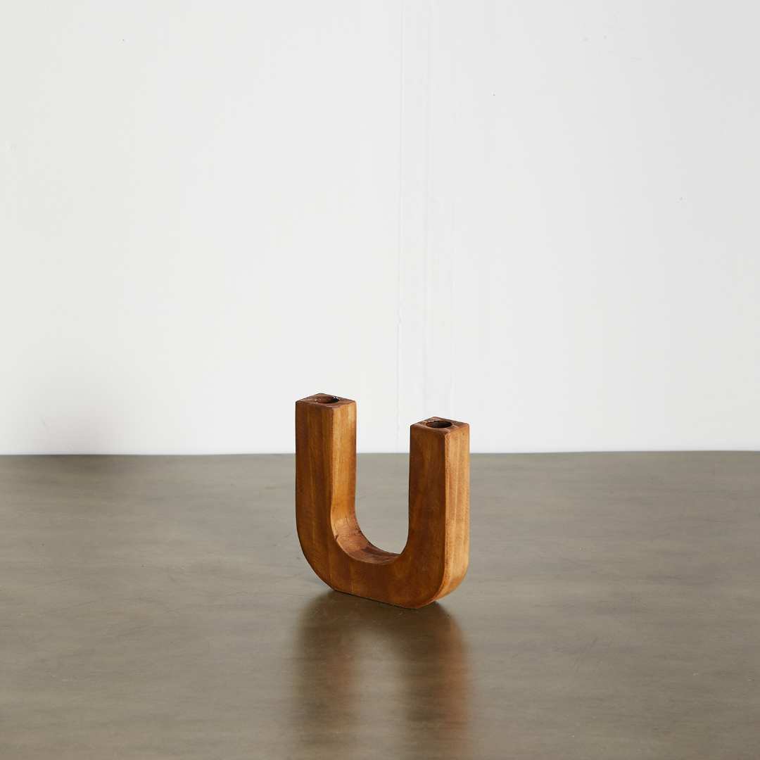 Lifestyle photo showing U-Shaped Wooden Double Taper Candlestick Holder in use - Kanju Interiors