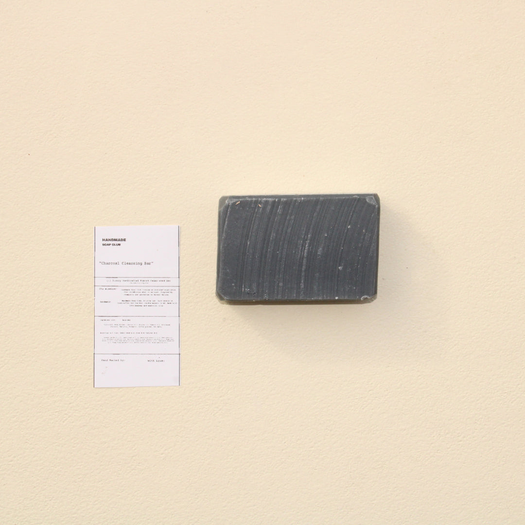 Lifestyle photo showing Detoxifying Charcoal Cleansing Bar in use - Handmade Soap Club