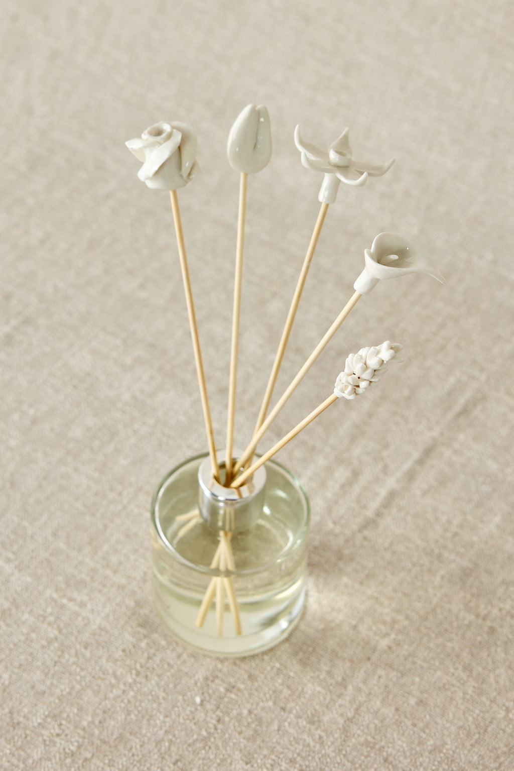 Lifestyle photo showing Country Flowers Bamboo Diffuser Sticks Set in use - Kanju Interiors