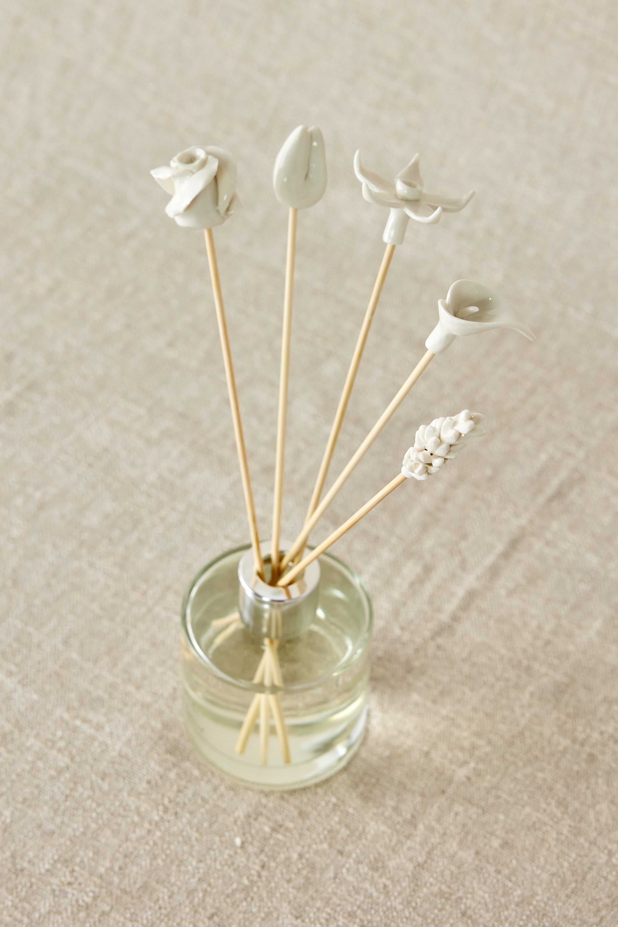 Lifestyle photo showing Country Flowers Bamboo Diffuser Sticks Set in use - Kanju Interiors
