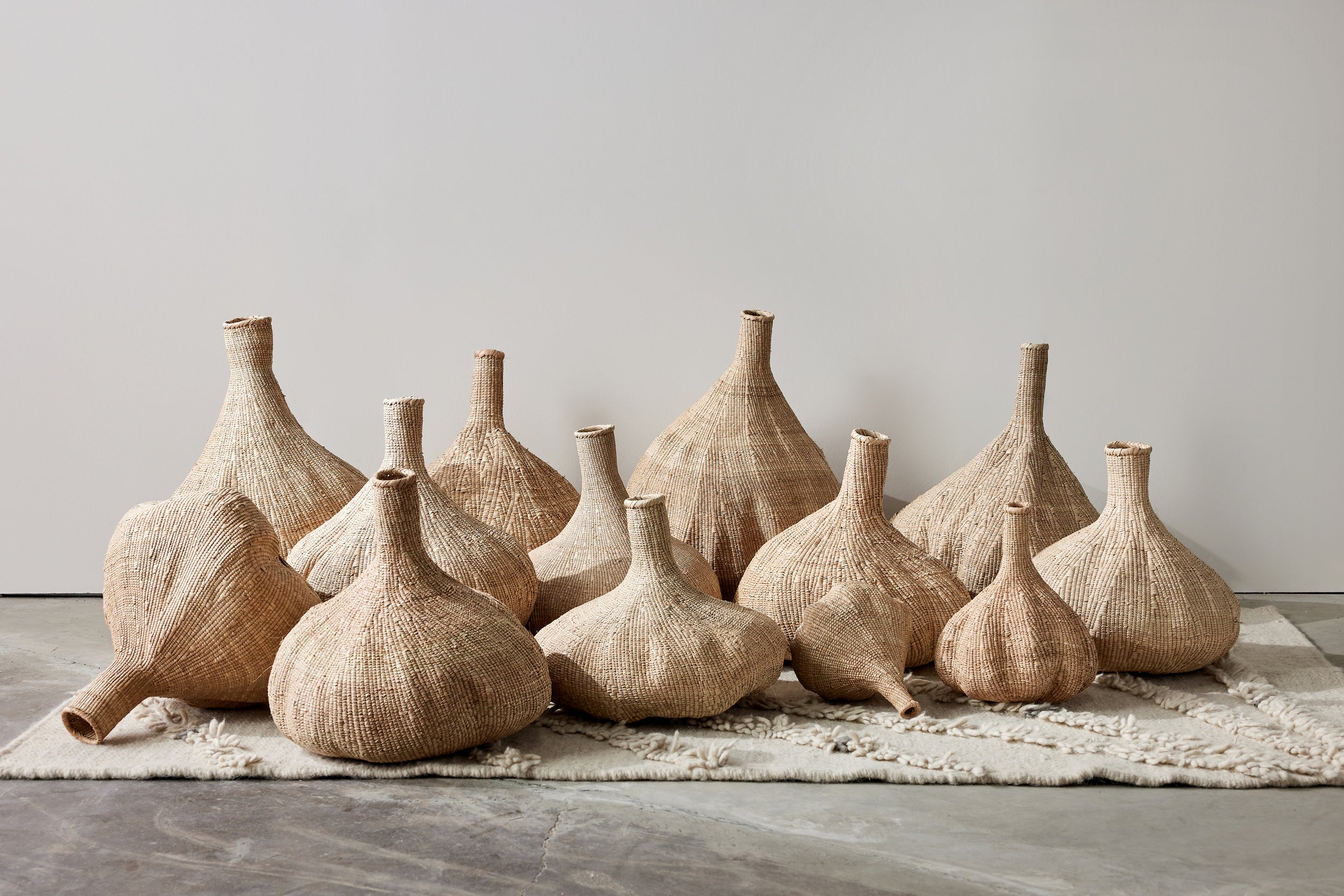 Lifestyle photo showing Long-Necked Ilala Garlic Gourd Basket in use - Kanju Interiors