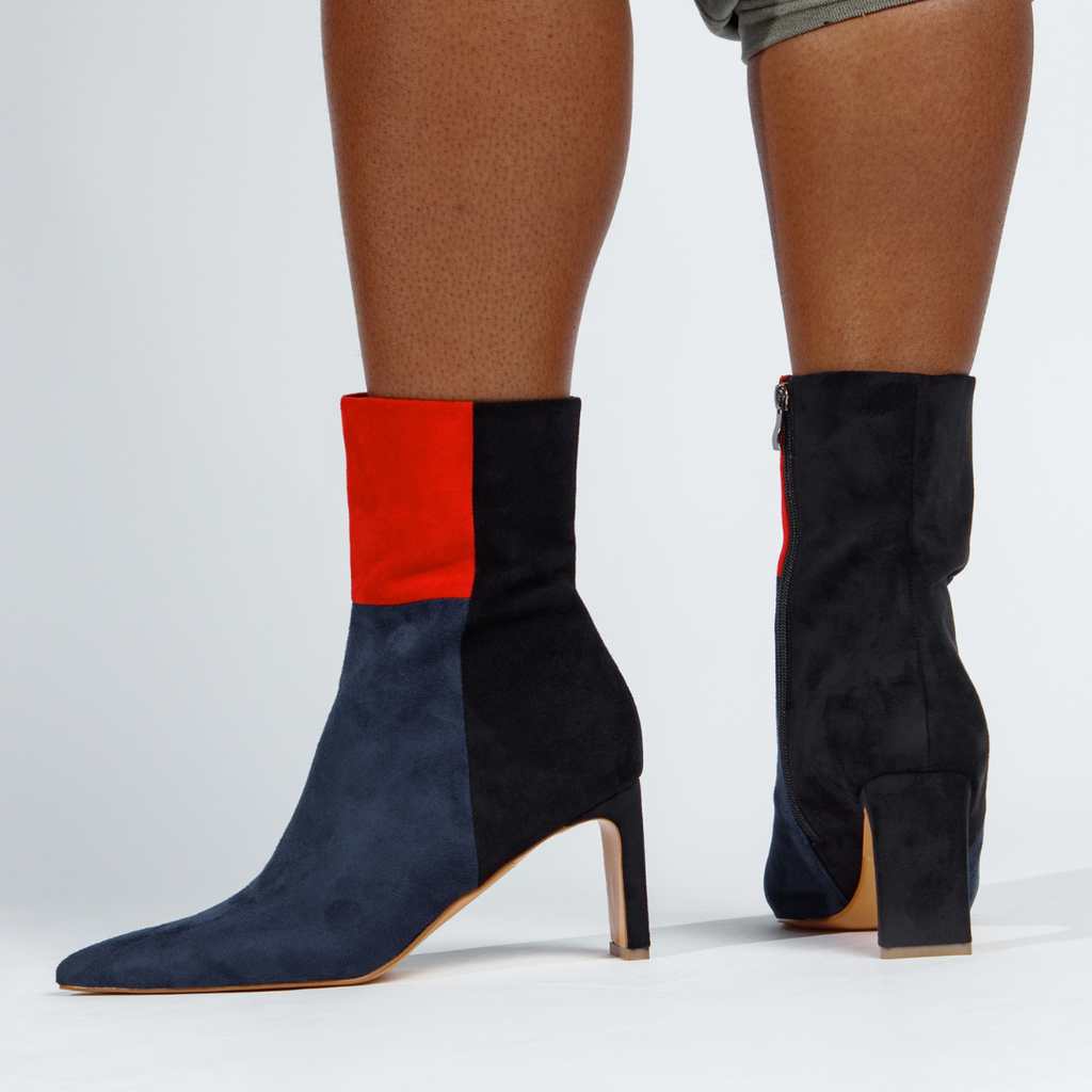 Lifestyle photo showing Simone Booties Red in use - Vaila Shoes