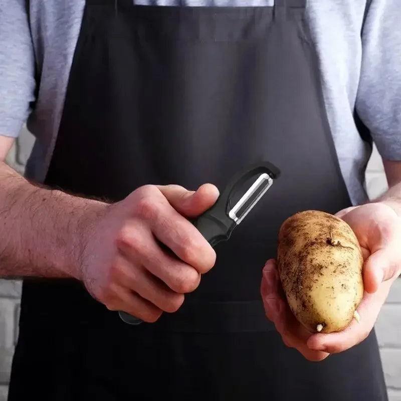 Lifestyle photo showing Swivel Vegetable Peeler with Dual Blades Stainless Steel Potato P in use - V.I.P Digital Presence