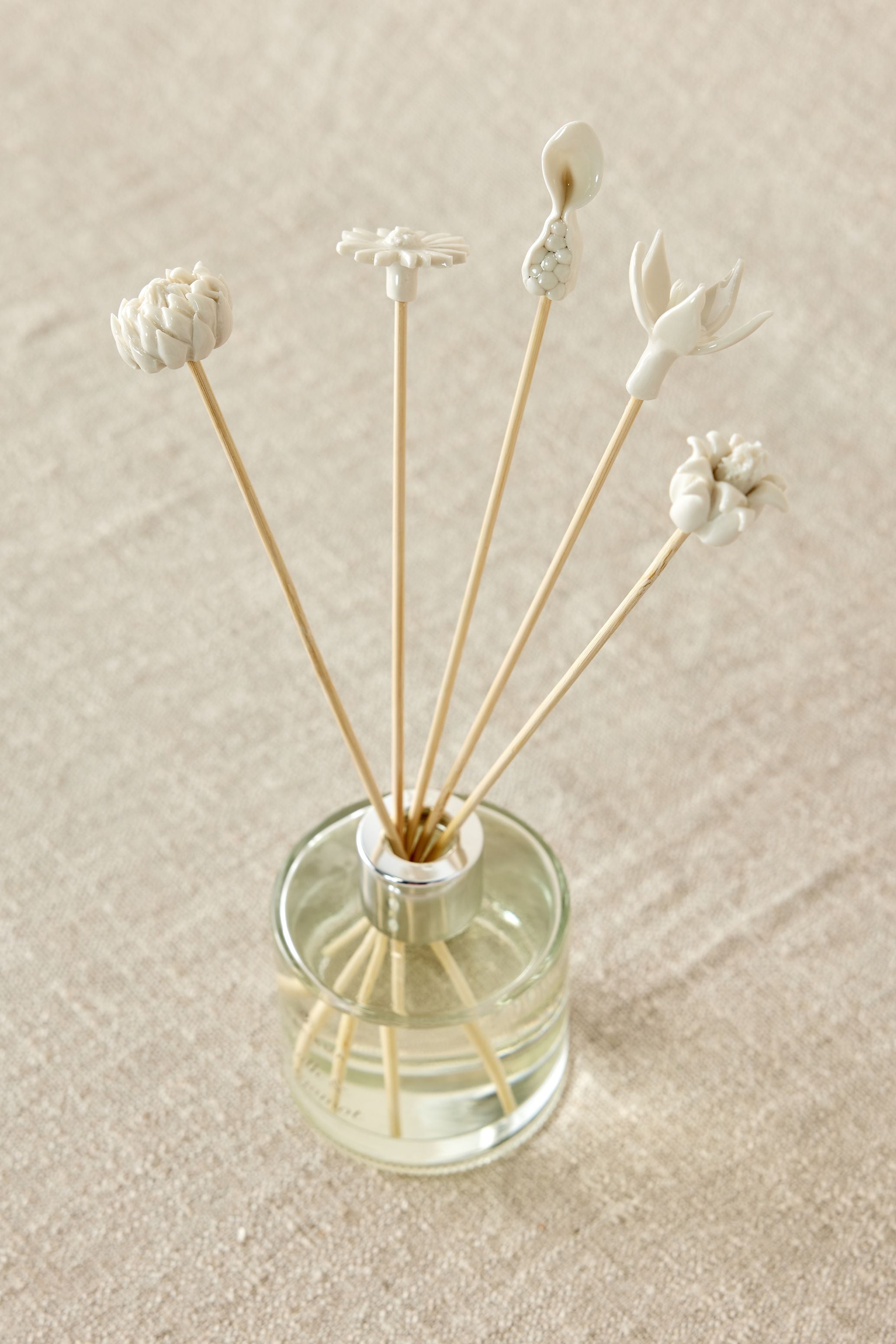 Lifestyle photo showing African Flowers Bamboo Diffuser Set in use - Kanju Interiors