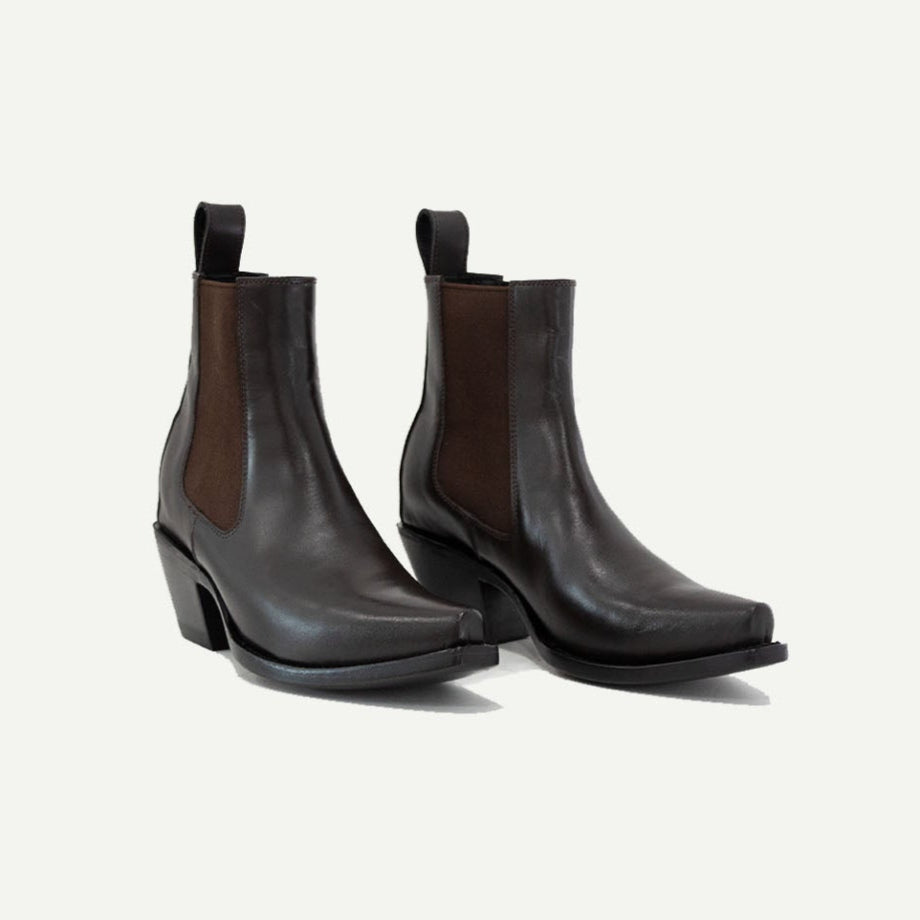 Lifestyle photo showing M-O-NINE The Sandra Boot in Chocolate Brown in use - M-O-NINE