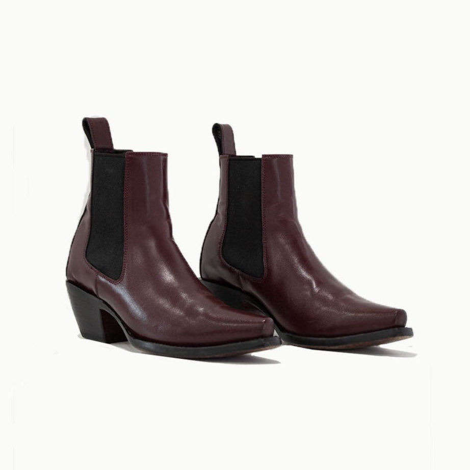 Lifestyle photo showing M-O-NINE The Sandra Boot in Burgundy in use - M-O-NINE