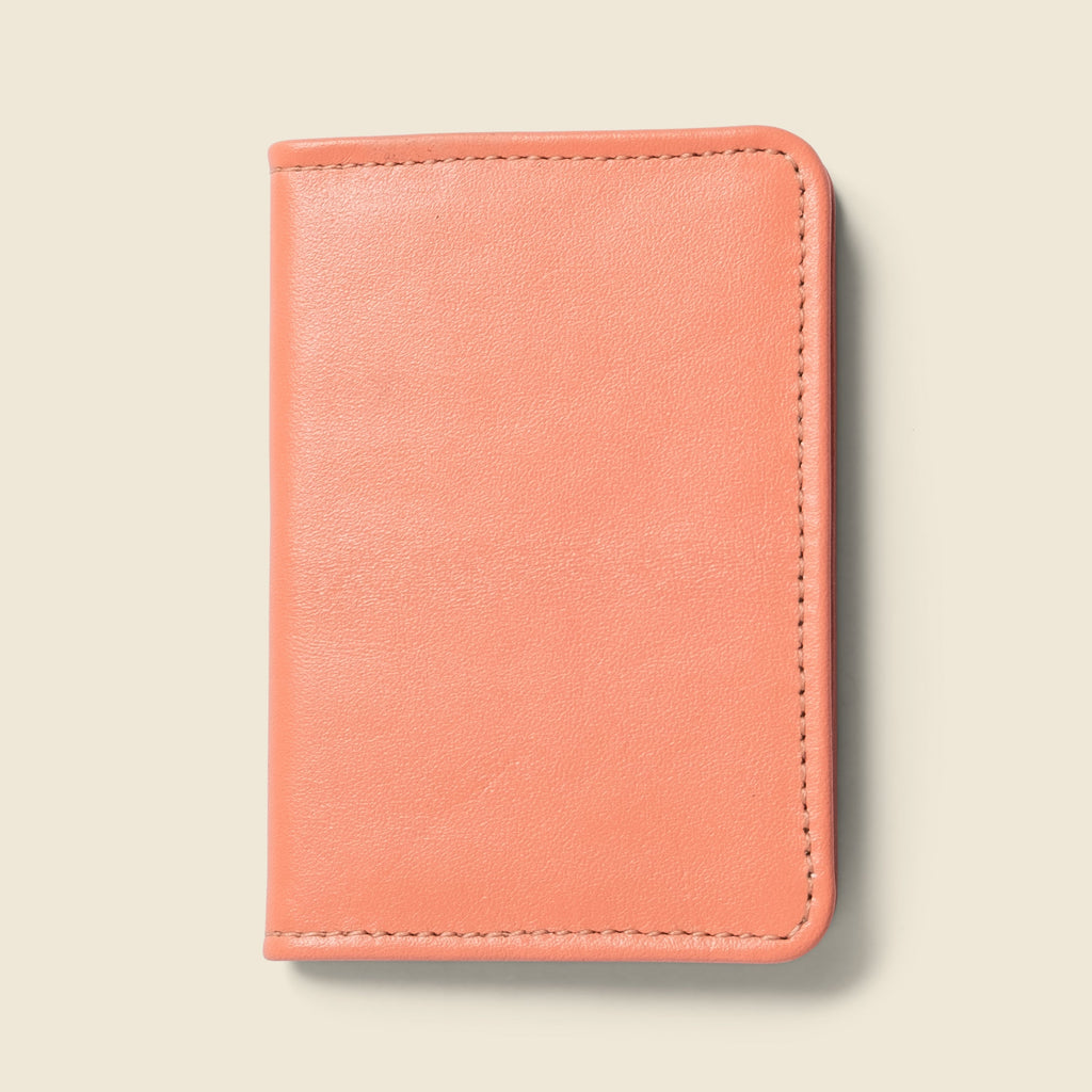 Lifestyle photo showing Compact Bifold with RFID Protection - Pink in use - CASUPO