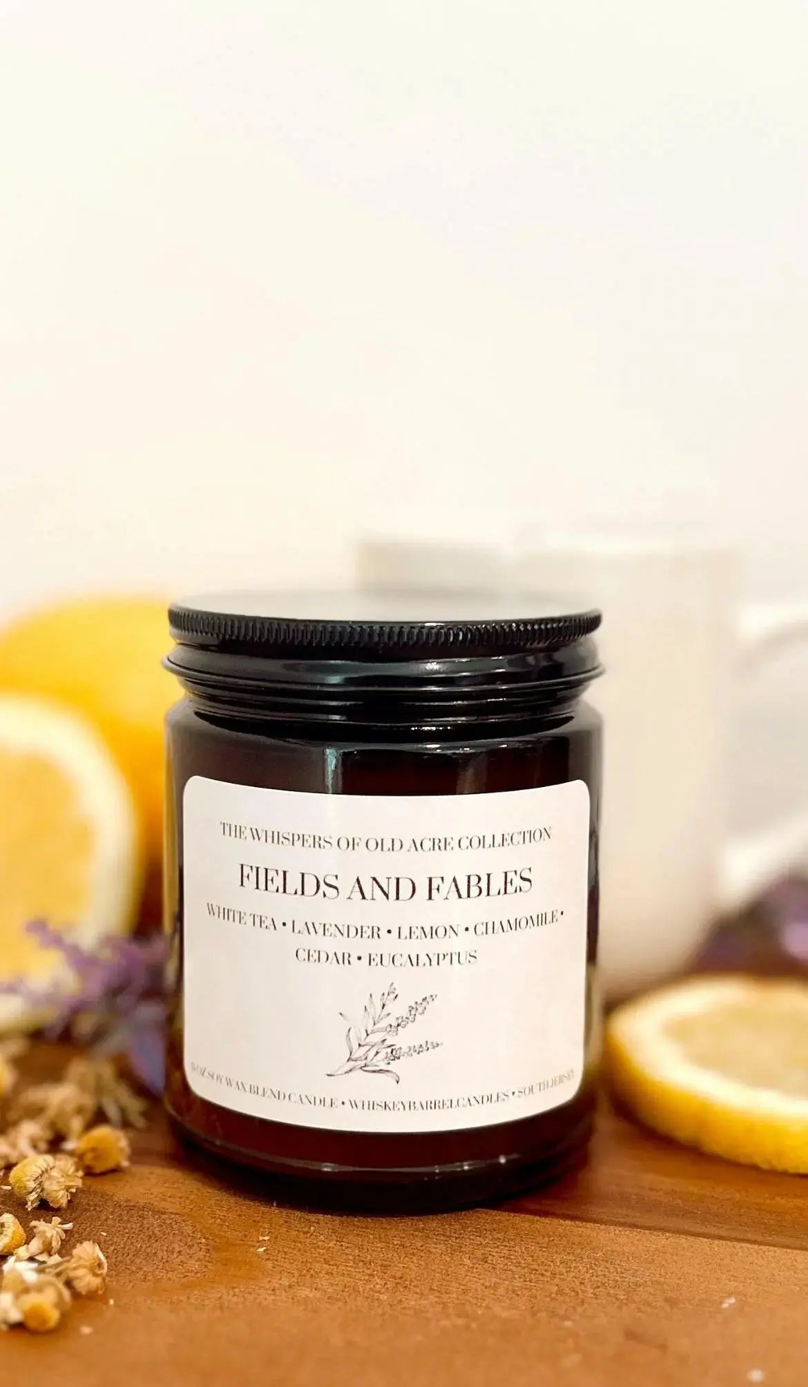 Lifestyle photo showing The Whispers of Old Acre Collection in use - Whiskey Barrel Candles