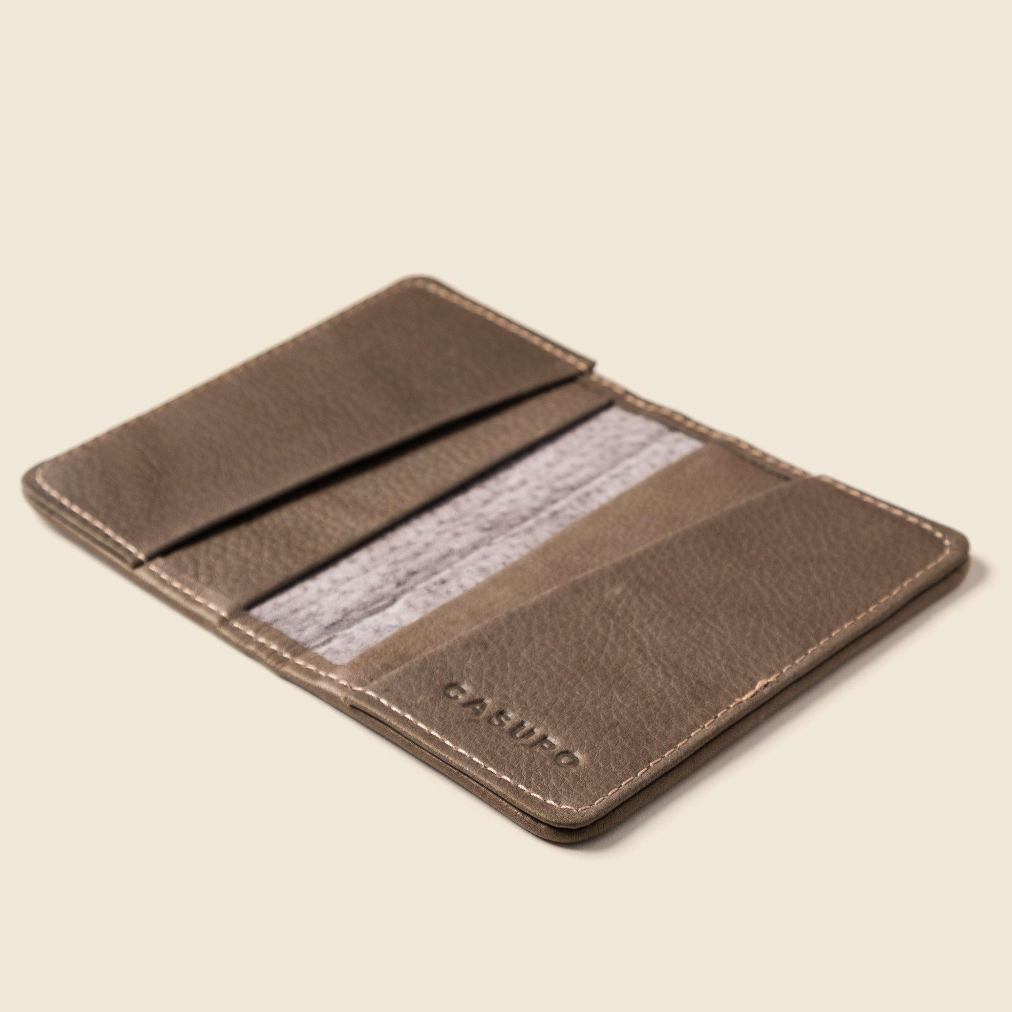 Lifestyle photo showing Compact Bifold with RFID Protection - Grey in use - CASUPO