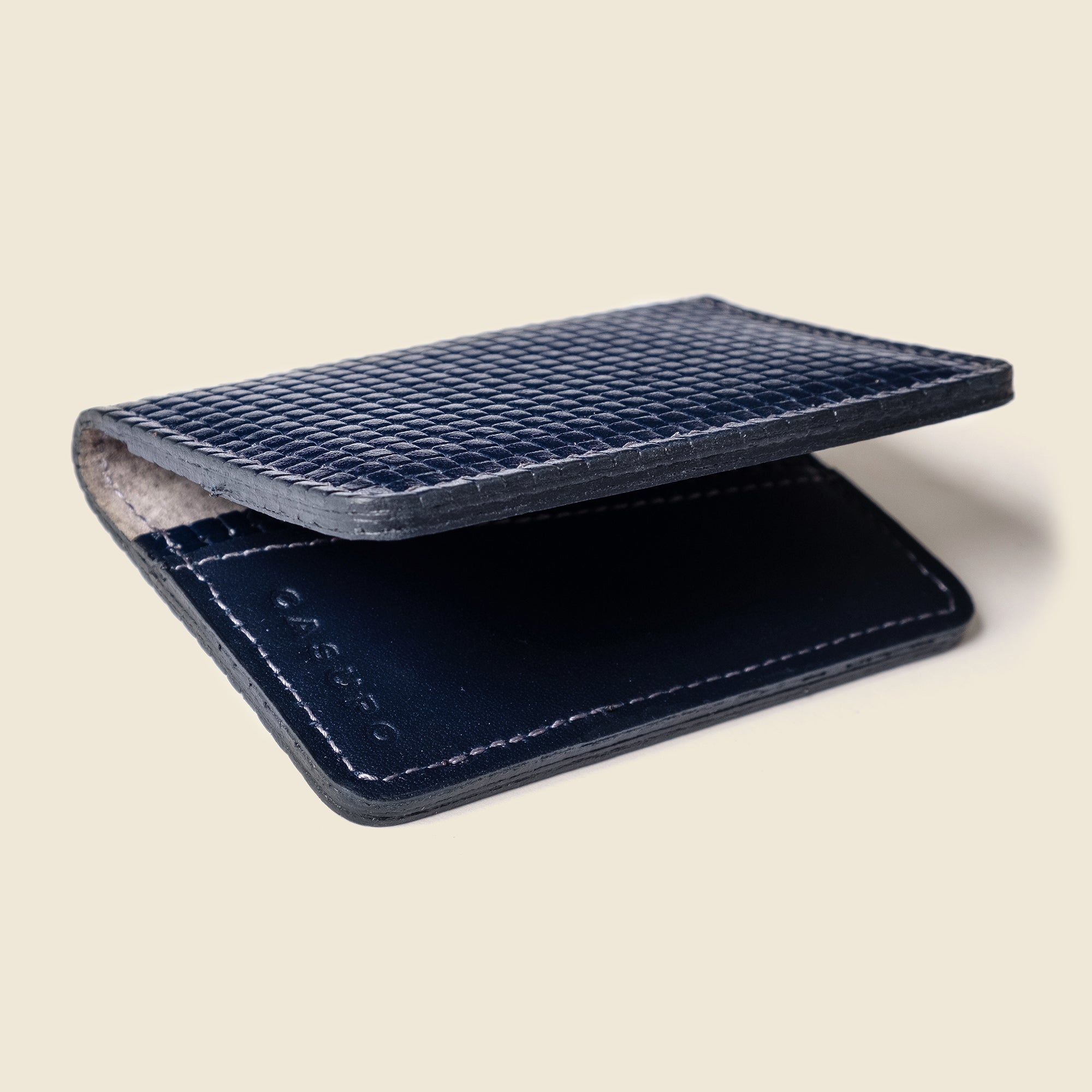 Lifestyle photo showing Compact Bifold with RFID Protection - Navy Limited Edition in use - CASUPO