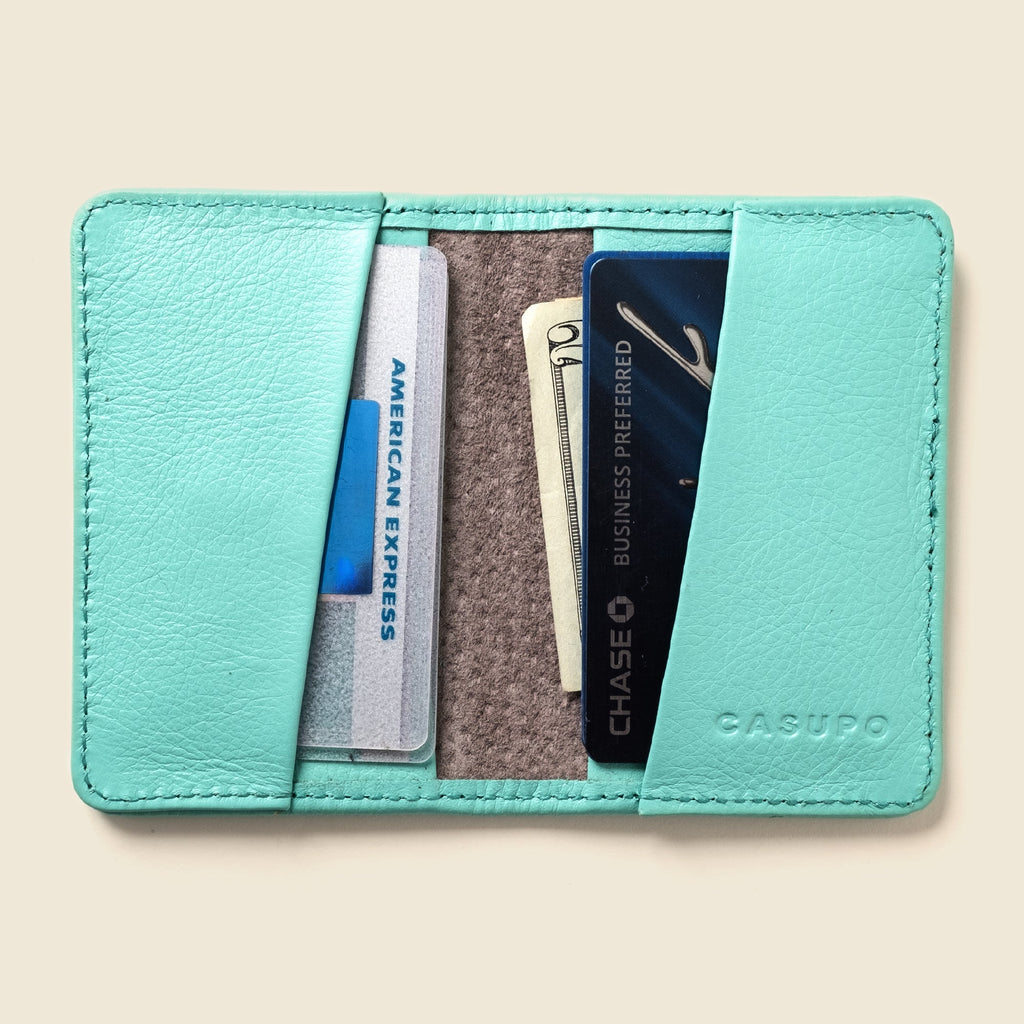 Lifestyle photo showing Compact Bifold with RFID Protection - Baby Blue in use - CASUPO