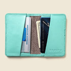 Lifestyle photo showing Compact Bifold with RFID Protection - Baby Blue in use - CASUPO