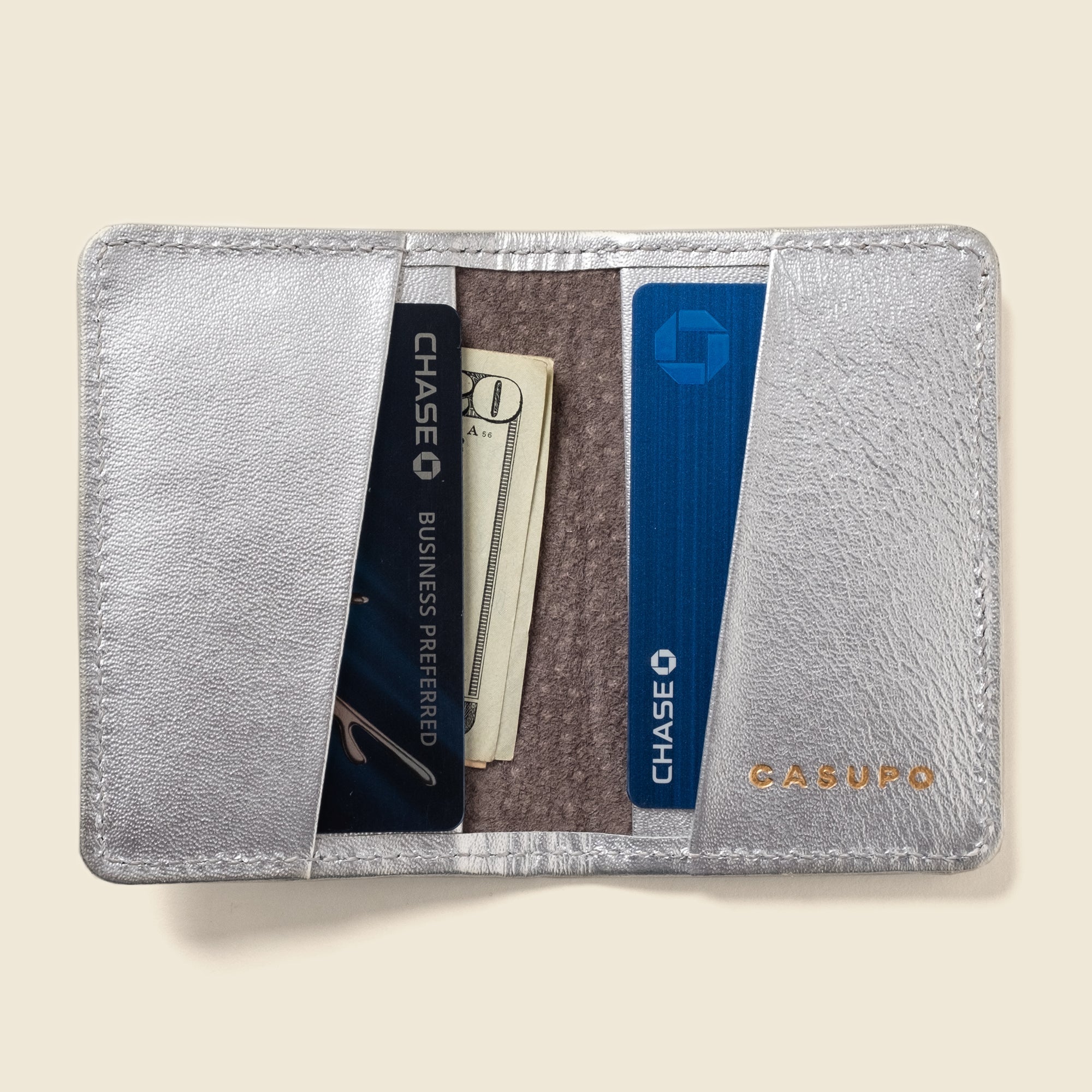 Lifestyle photo showing Compact Bifold with RFID Protection - Silver in use - CASUPO