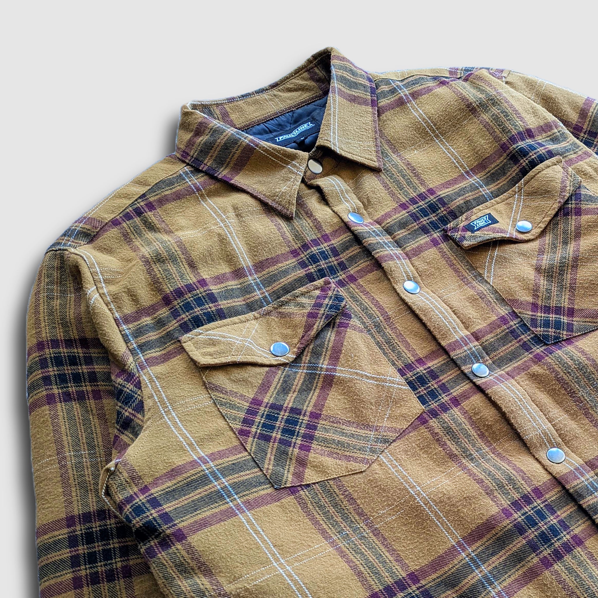 Lifestyle photo showing Juniper Insulated Flannel Shacket - Dijon/Maroon in use - Faultline395