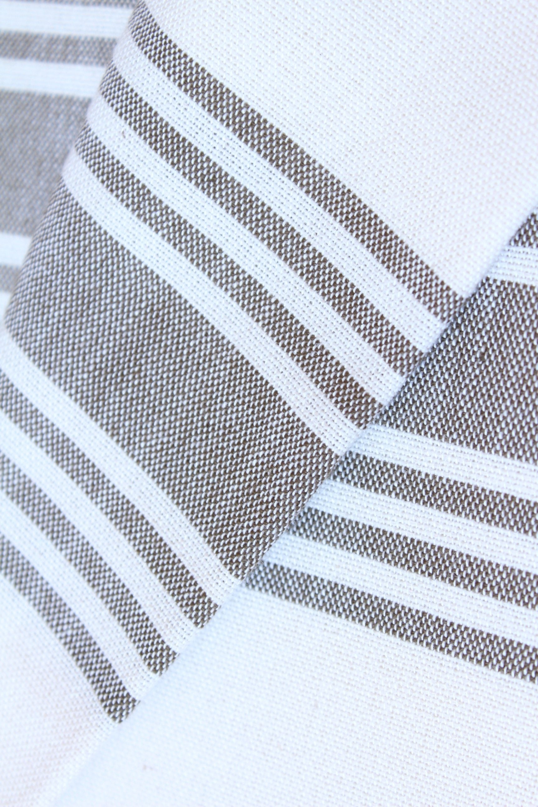 Lifestyle photo showing Figueres - White in use - Beach House Towels