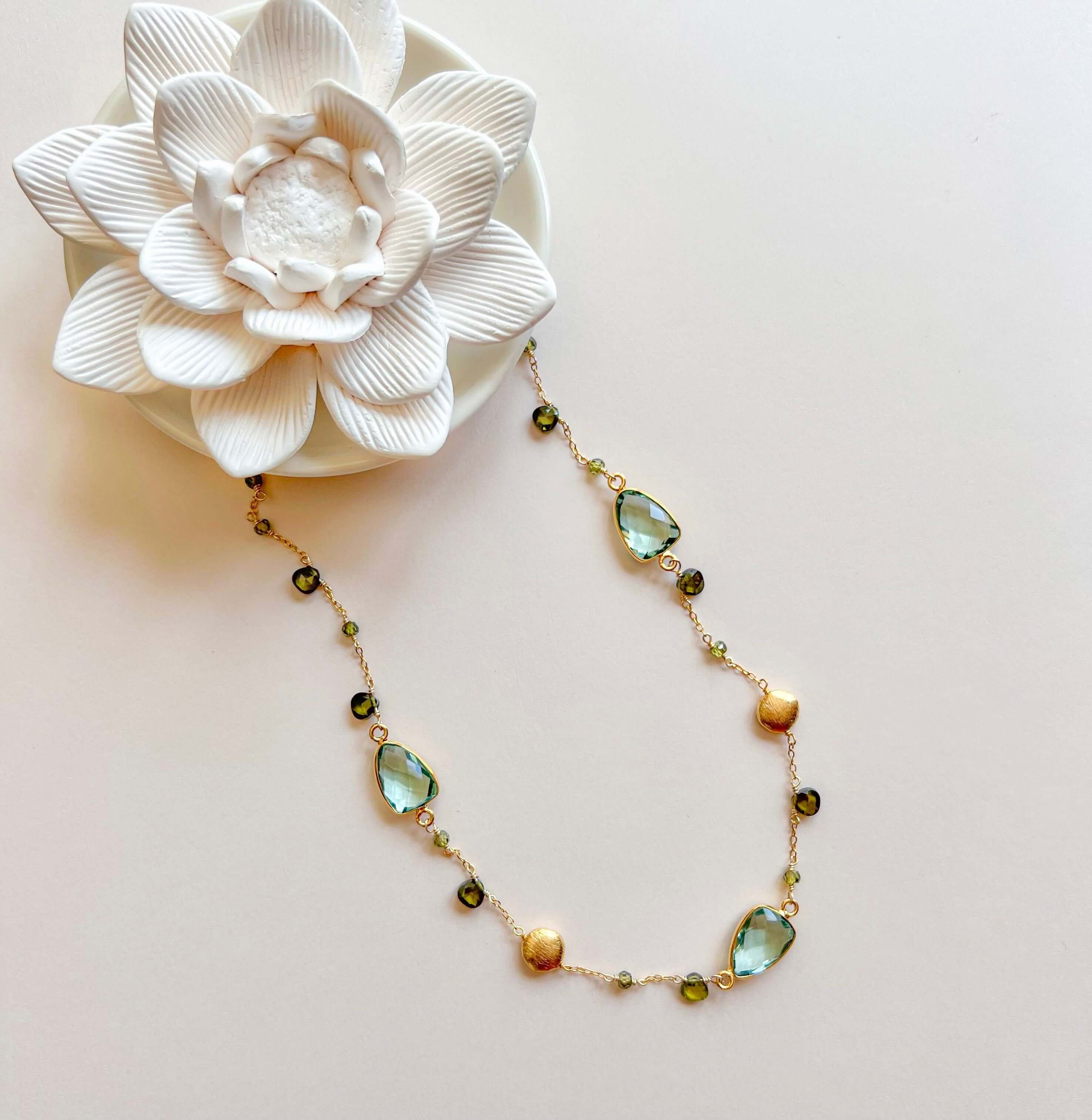 Lifestyle photo showing PARKEN JEWELRY Green Amethyst Gold Bezel Chain in use - PARKEN JEWELRY