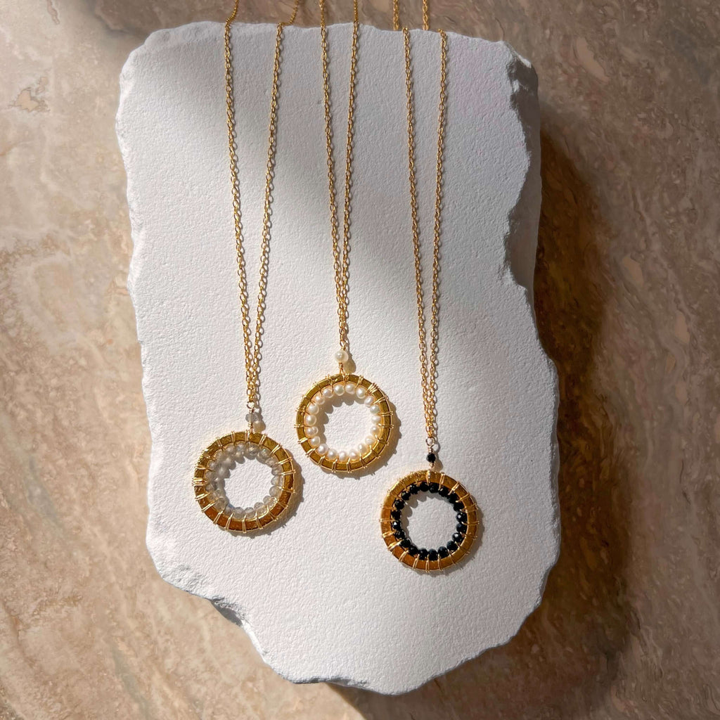 Lifestyle photo showing PARKEN JEWELRY Pearl, Labradorite and Black Spinel Halo Mini Gold in use - PARKEN JEWELRY