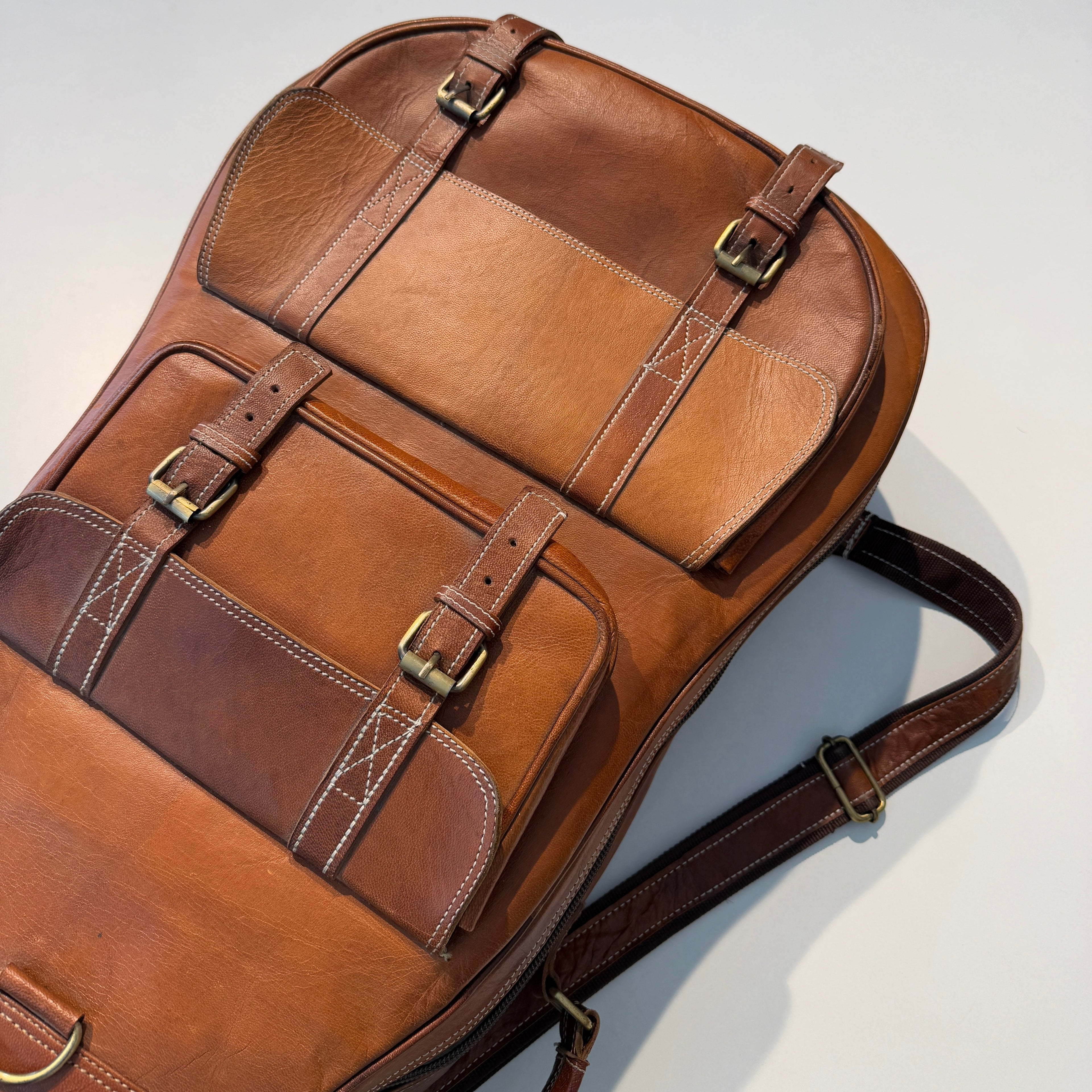 Lifestyle photo showing Personalized Leather Guitar Case in use - Classy Leather Bags