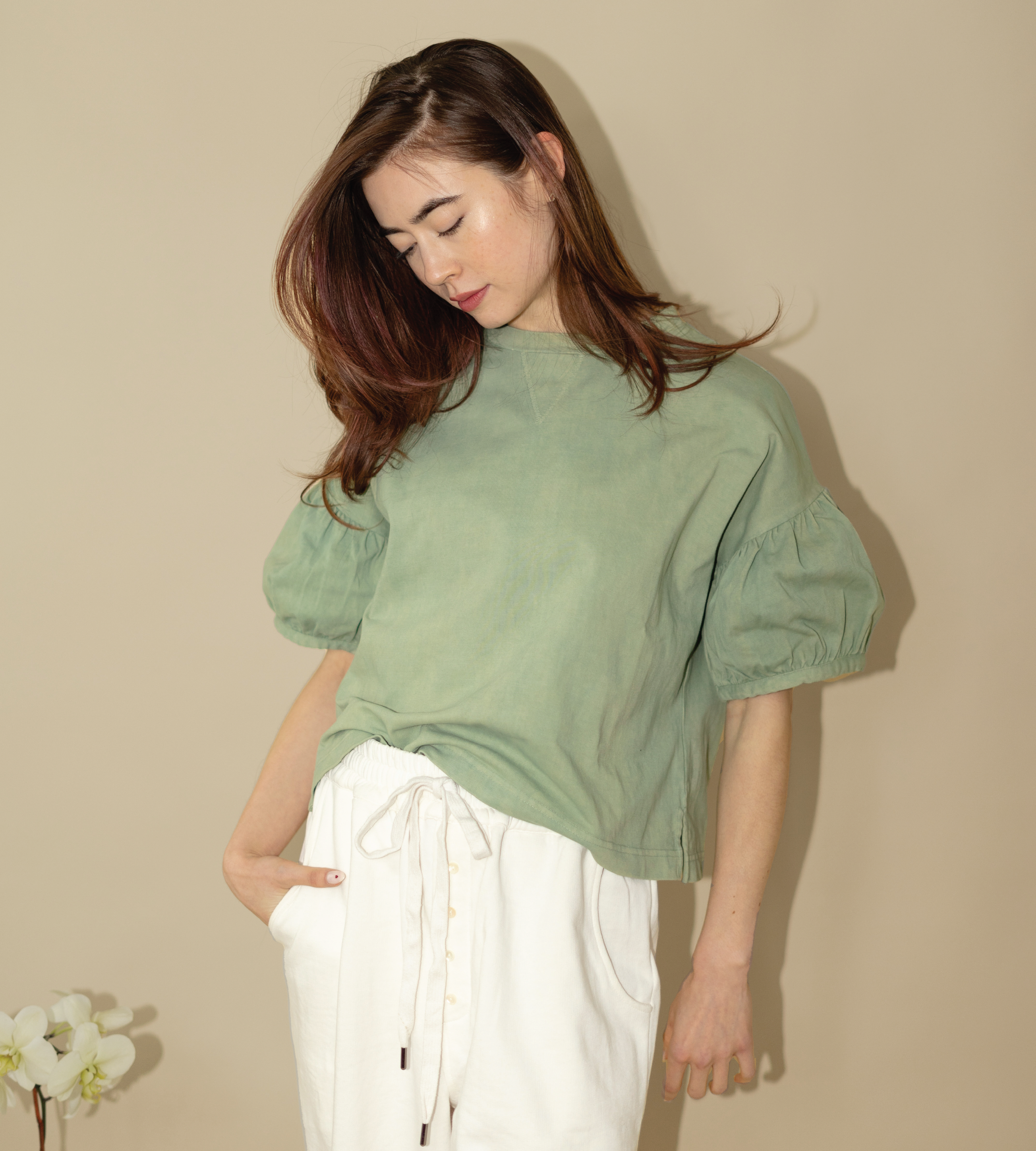 Close-up detail showing quality craftsmanship and materials - Intention Tee