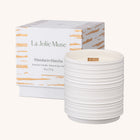 Lifestyle photo showing Lucienne - Mandarin Matcha Candle in use - LA JOLIE MUSE