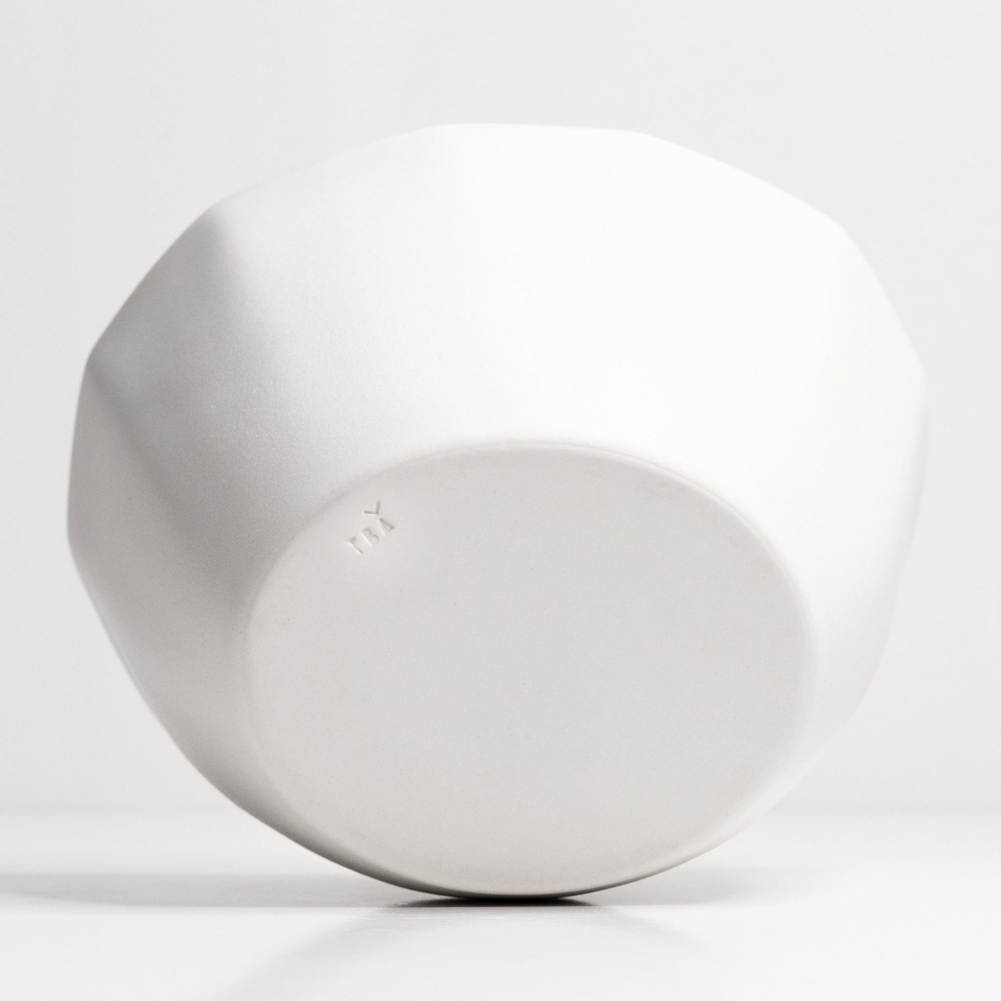 Lifestyle photo showing Large Porcelain Nesting Bowl in use - Ember Collective