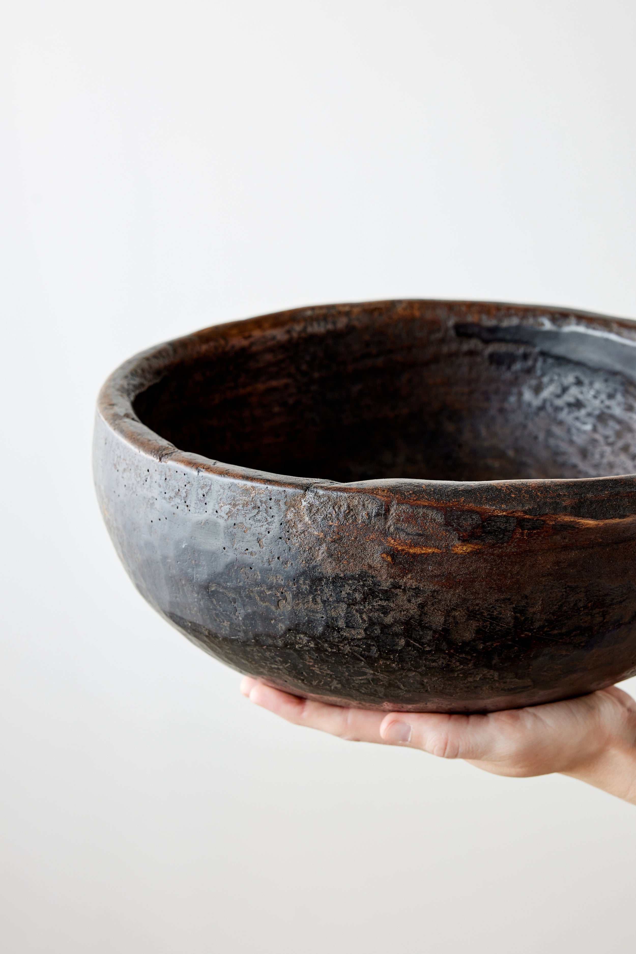 Lifestyle photo showing Vintage Iroko Wood Bowl in use - Kanju Interiors