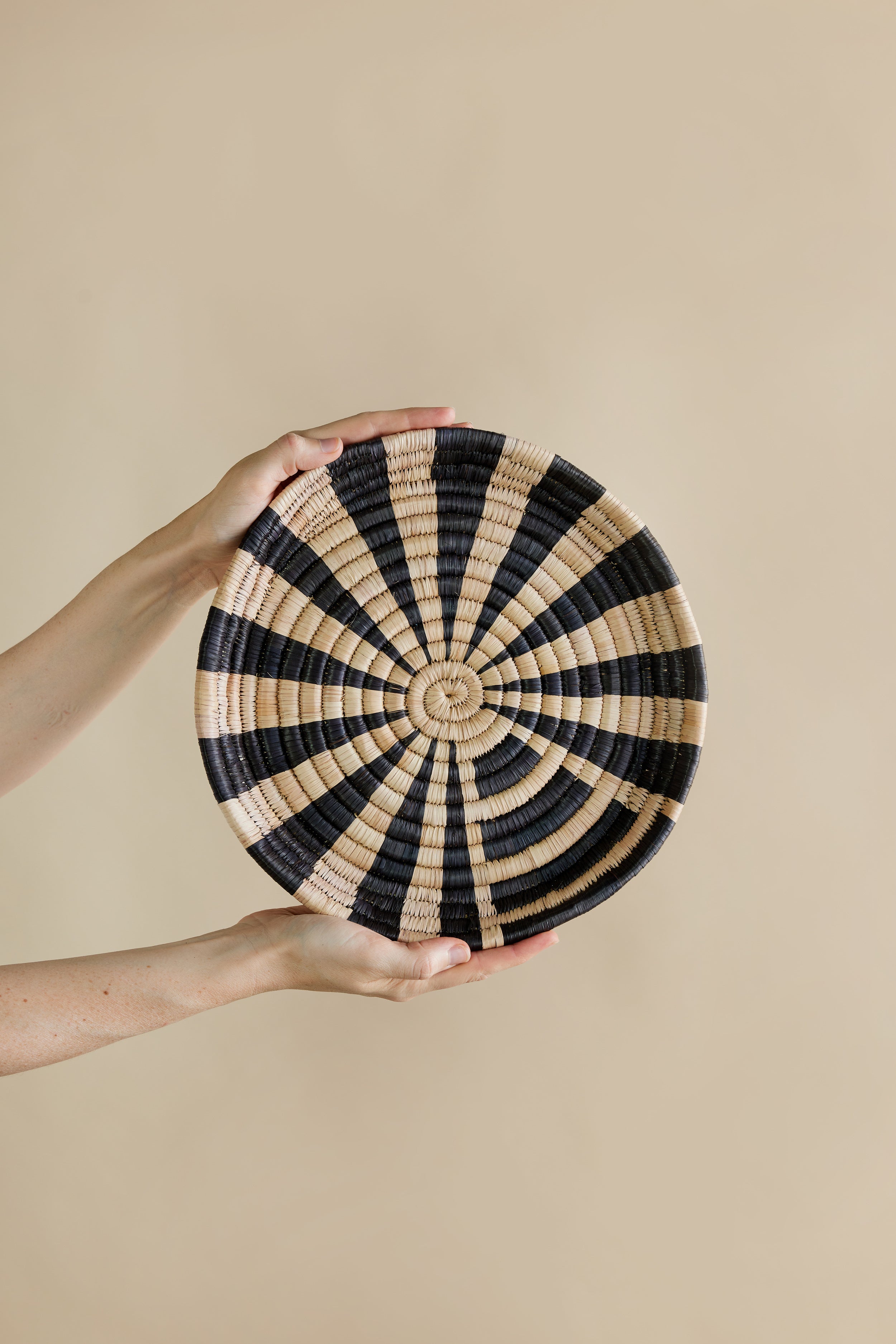 Lifestyle photo showing Zulo Woven Wall Disc in use - Kanju Interiors