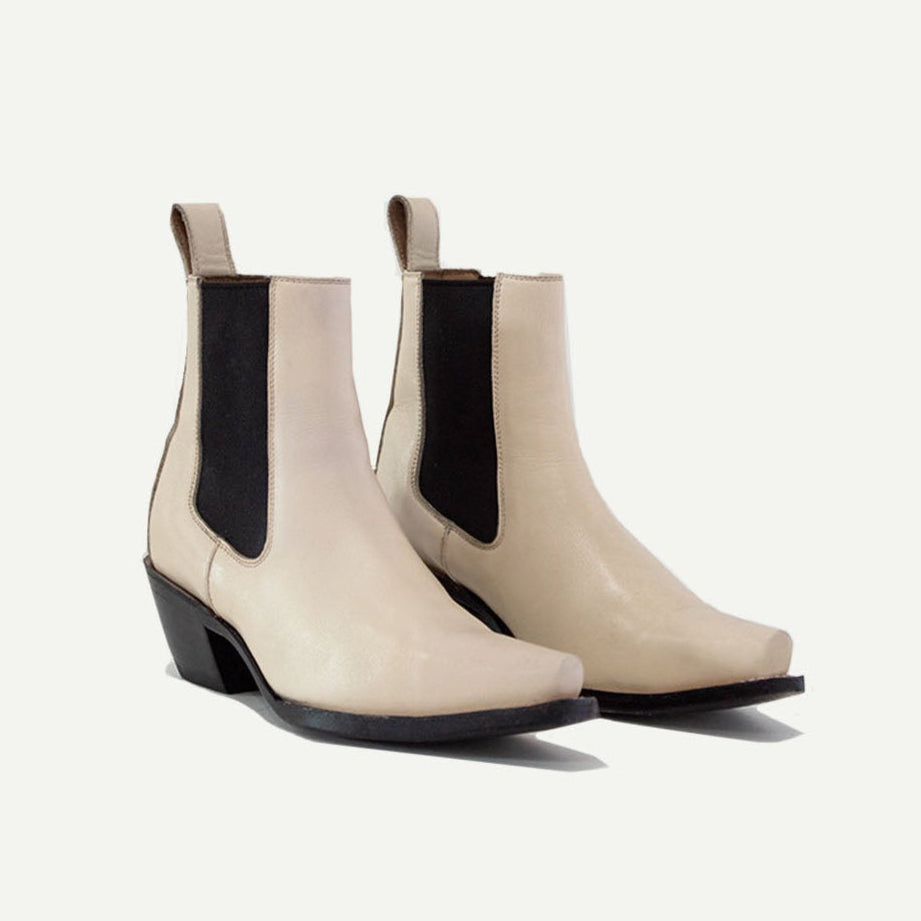 Lifestyle photo showing M-O-NINE The Sandra Boot in Bone in use - M-O-NINE