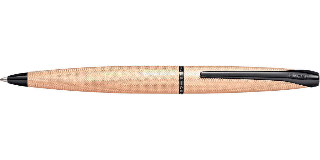 Lifestyle photo showing A.T. Cross ATX Brushed Rose Gold Ballpoint Pen - Comfortable Prof in use - A.T. Cross