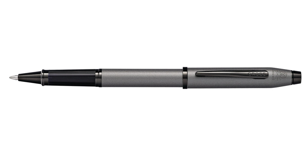Lifestyle photo showing A.T. Cross Century II Gunmetal Gray Rollerball Pen - Natural Left in use - A.T. Cross