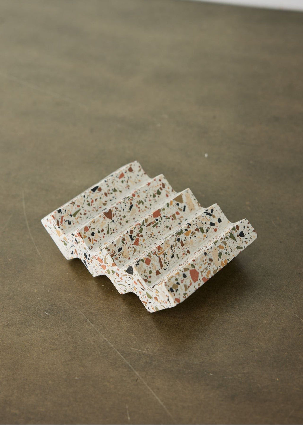 Lifestyle photo showing Zig-Zag Neutral Terrazzo Soap Dish in use - Kanju Interiors