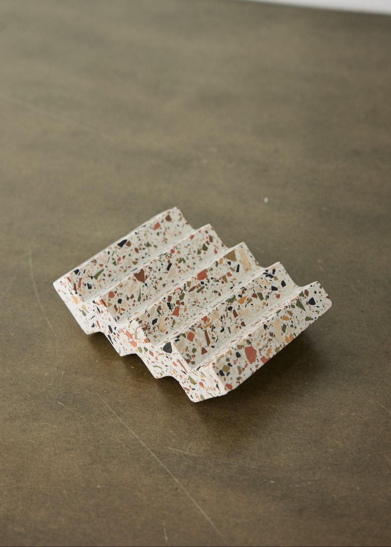 Lifestyle photo showing Zig-Zag Neutral Terrazzo Soap Dish in use - Kanju Interiors