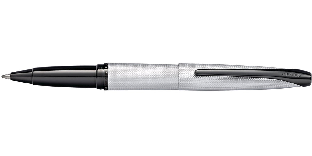 Lifestyle photo showing A.T. Cross ATX Brushed Chrome Rollerball Pen - Natural Left-Hande in use - A.T. Cross