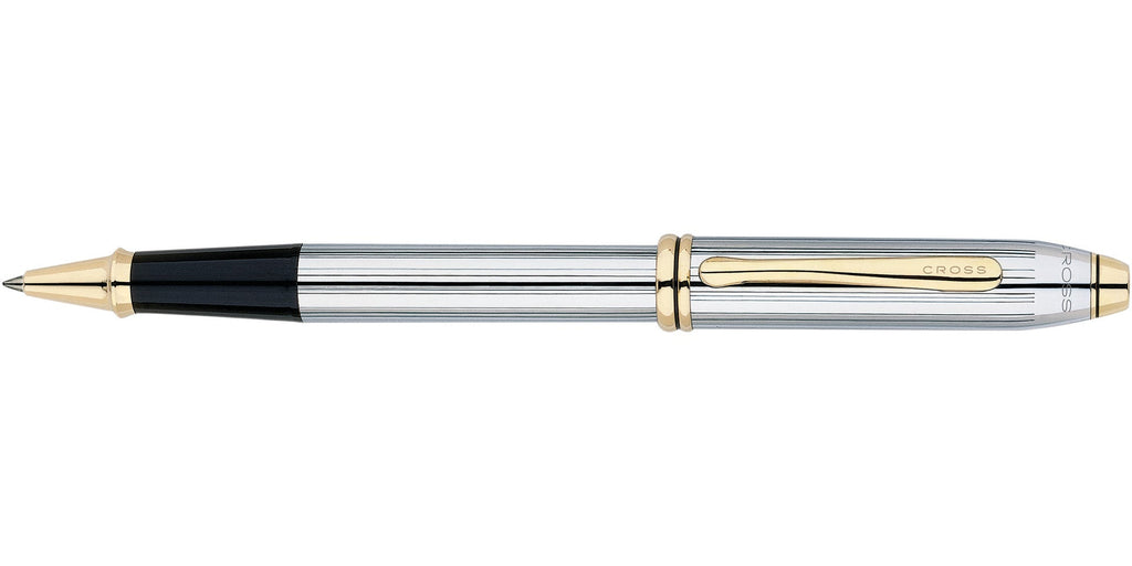 Lifestyle photo showing A.T. Cross Townsend Medalist Rollerball Pen - Natural Left-Handed in use - A.T. Cross