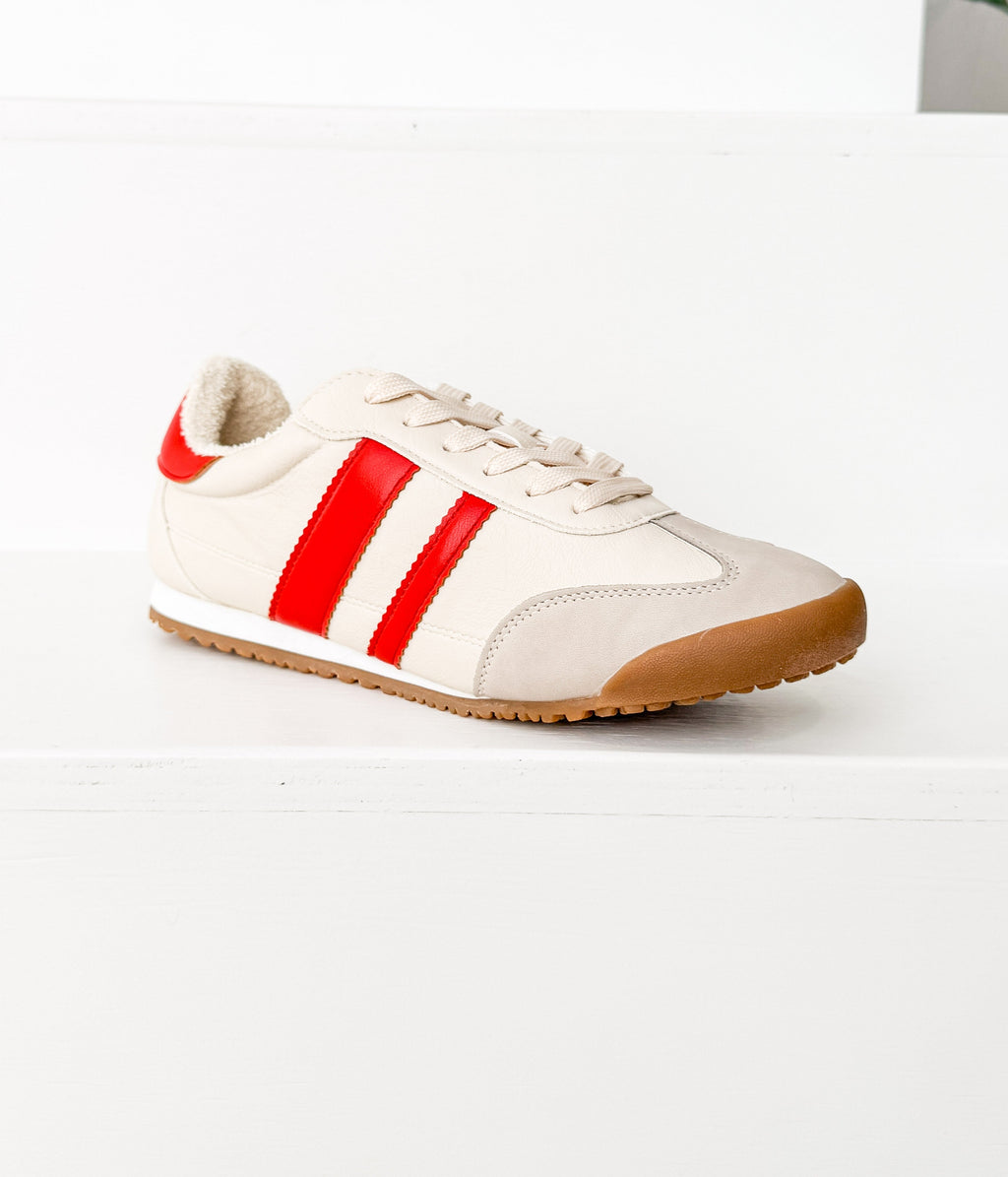 Lifestyle photo showing Madrid Sneaker in Beige/Red in use - Naughty Monkey