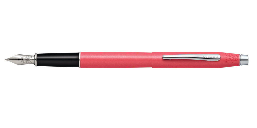 Lifestyle photo showing A.T. Cross Classic Century Coral Pearlescent Lacquer Fine Nib Fou in use - A.T. Cross