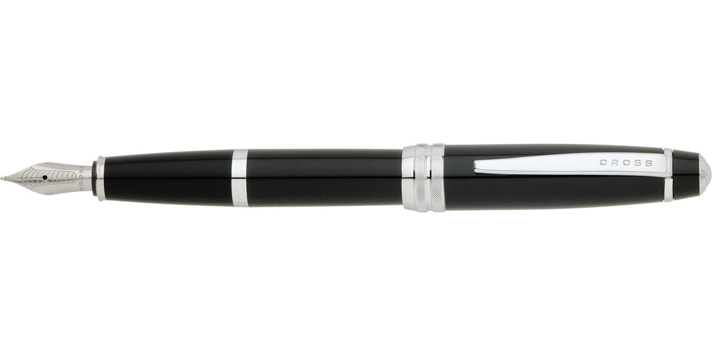 Lifestyle photo showing A.T. Cross Bailey Black Lacquer Stainless Steel Medium Nib Founta in use - A.T. Cross