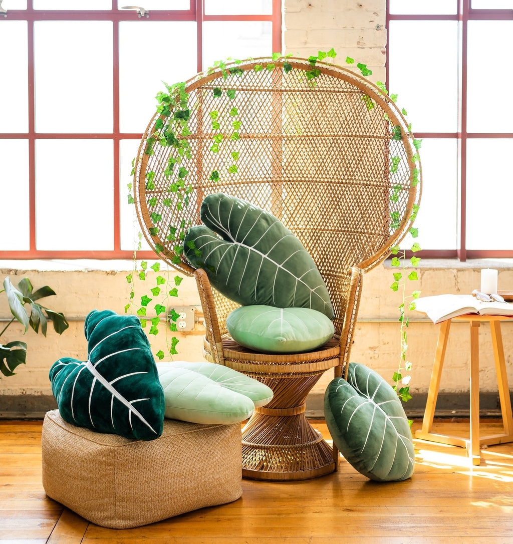 Lifestyle photo showing Philodendron Gloriosum Leaf Pillow - Moody Green in use - Green Philosophy Co.