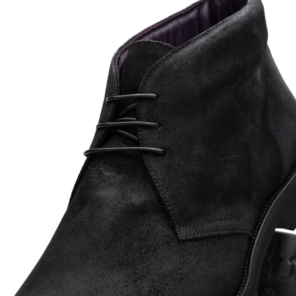 Lifestyle photo showing 46-602-BLK REZZA Suede Calfskin Chukka Boot Black in use - Zelli Italia