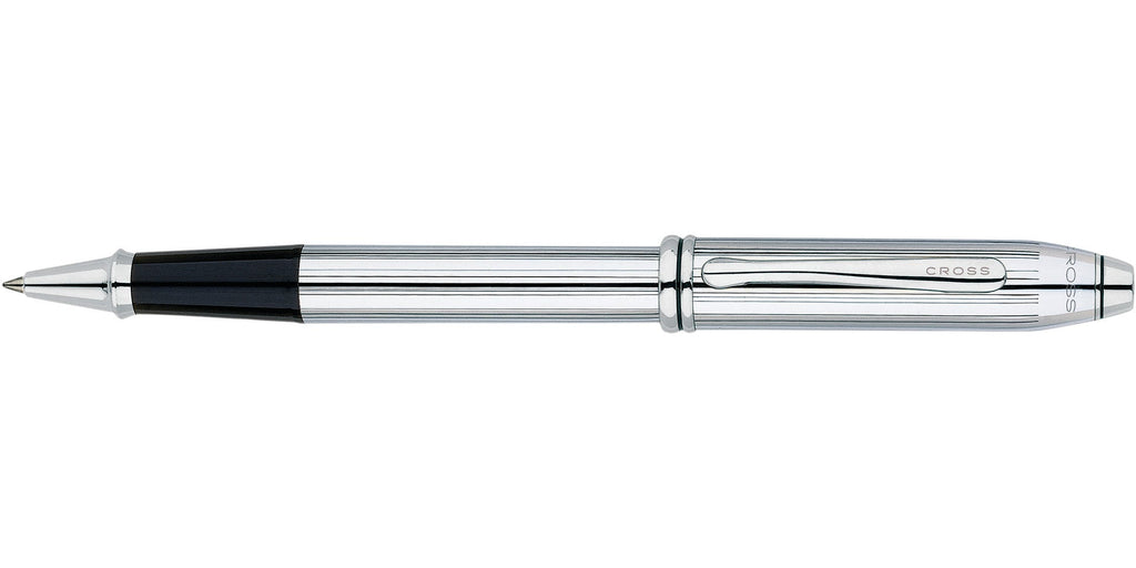 Lifestyle photo showing A.T. Cross Townsend Lustrous Chrome Rollerball Pen - Natural Left in use - A.T. Cross