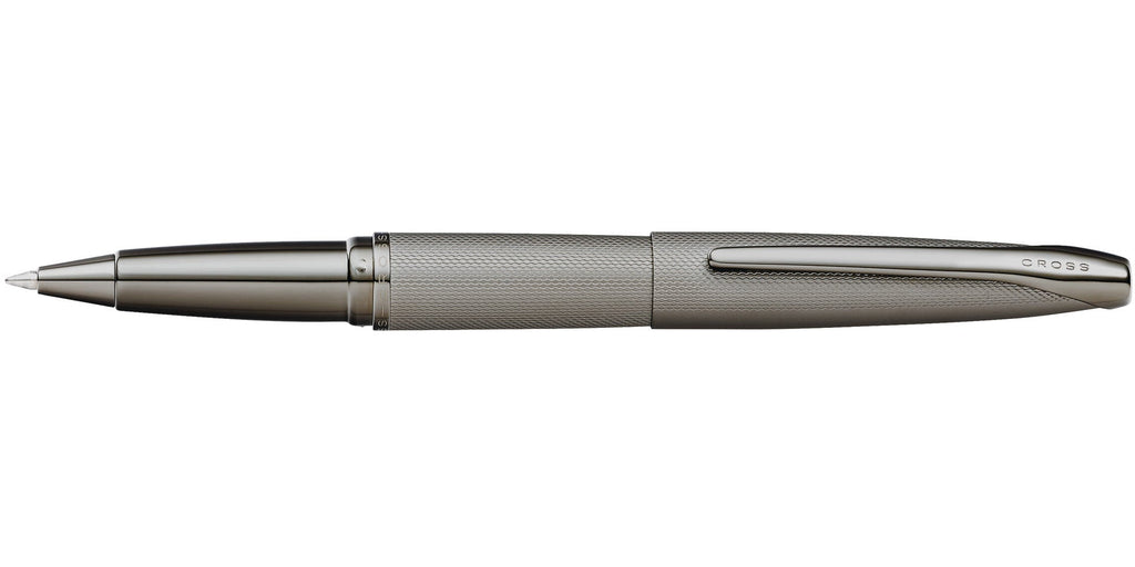 Lifestyle photo showing A.T. Cross ATX Sandblasted Titanium Gray Rollerball Pen - Natural in use - A.T. Cross