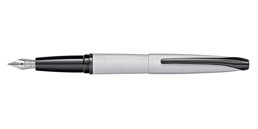 Lifestyle photo showing A.T. Cross ATX Brushed Chrome Medium Nib Fountain Pen - Smudge-Fr in use - A.T. Cross