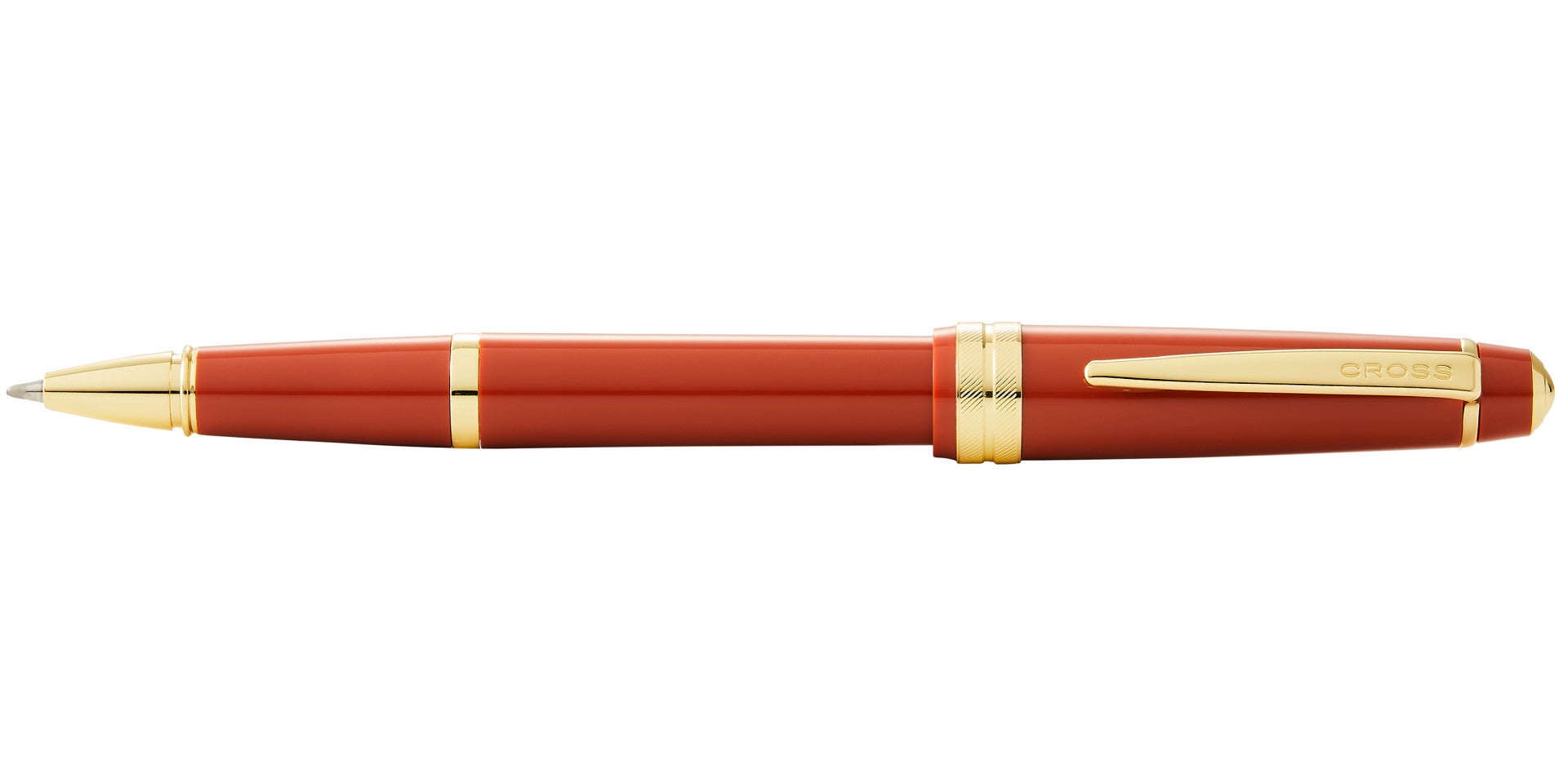 Lifestyle photo showing A.T. Cross Bailey Light Polished Amber Resin and Gold Tone Roller in use - A.T. Cross